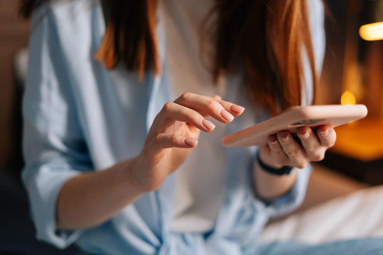 Close-up View Of Unrecognizable Woman Texting Message On Mobile